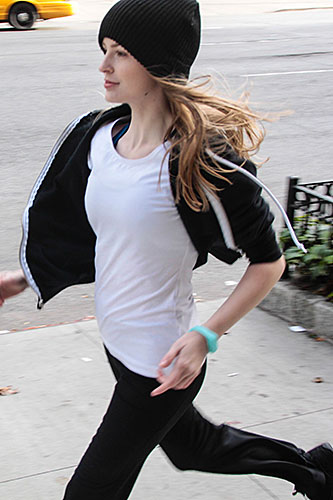 1 Voice Beanie Worn by Woman Jogging